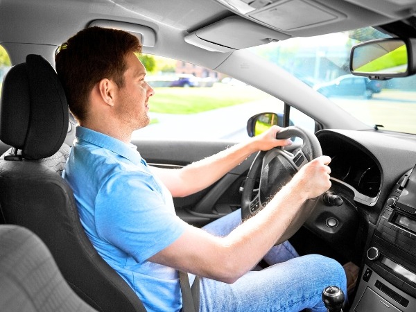 Man Driving a Car