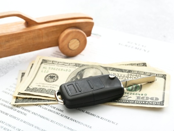 Car Key with Money and Rental Agreement