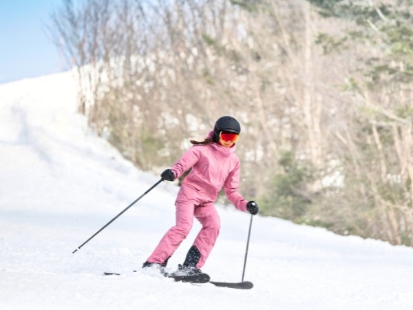 Girl Skiing Down a Slop
