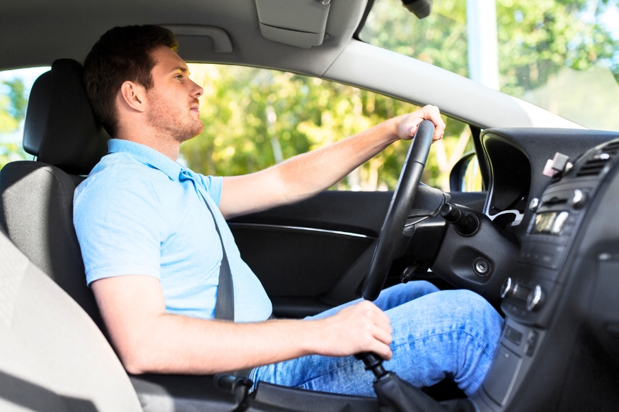 Man Driving a Car